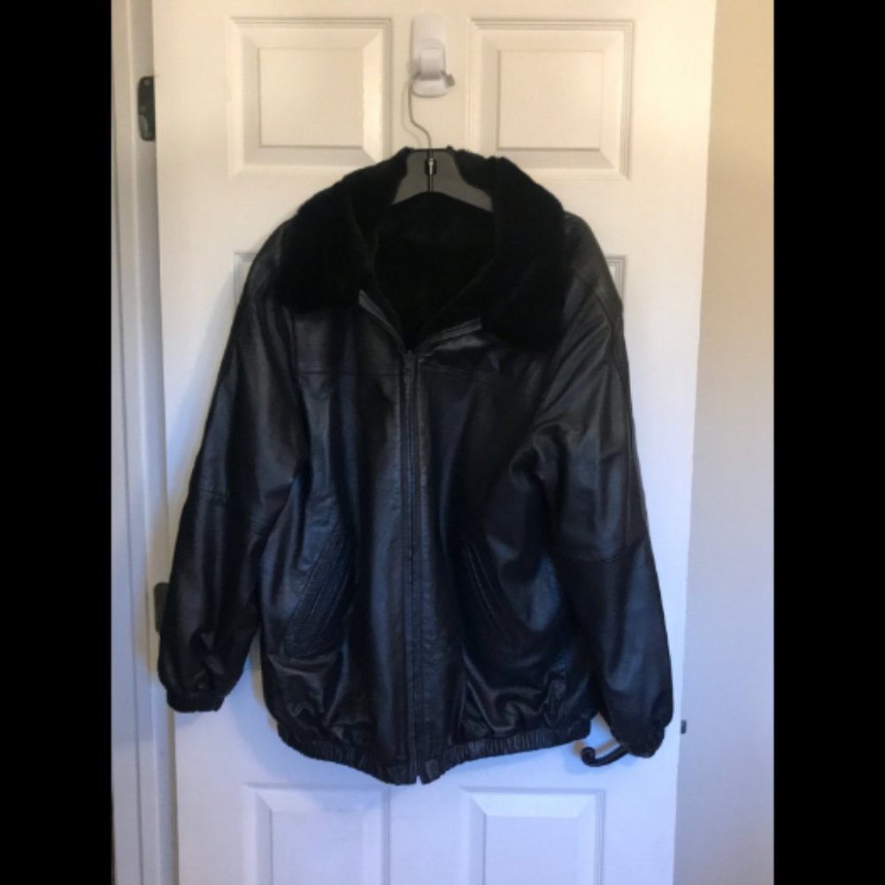 Size large, Black Leather and Real Sheared Fur Reversible Coat